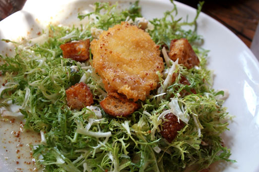 Frisee salad with a fried egg rar bar